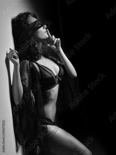 woman posing in casual underwear cloth and sensual black stripe