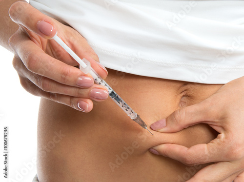Diabetes patient make rapid insulin shot by syringe subcutaneous
