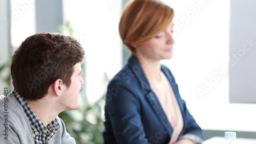 Wallpaper Mural Smiling business people sitting in conference room Torontodigital.ca