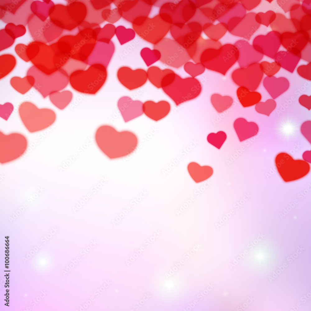 Valentines Day background with scattered blurred tender hearts