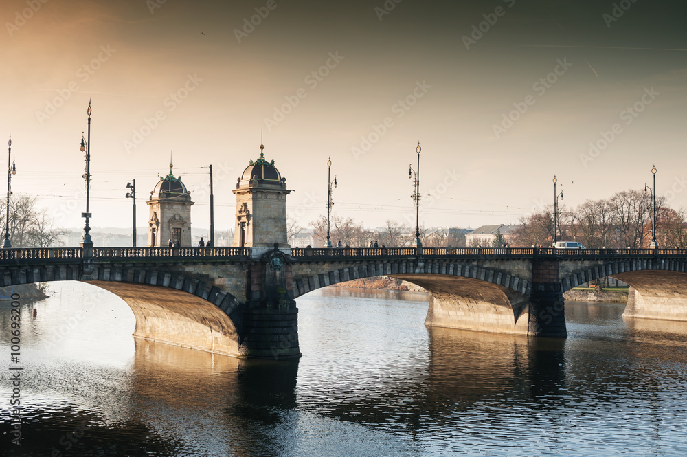 Legion Bridge on Vltava river at morning sunlight.