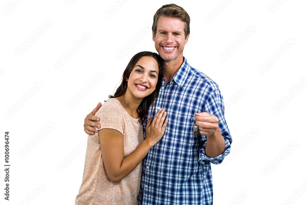 Portrait of happy couple with keys Portrait of happy couple with keys