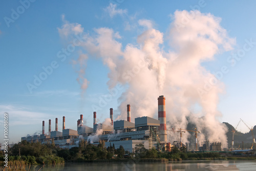 smoke from Coal-Fired Power Plant with blue sky in morning day