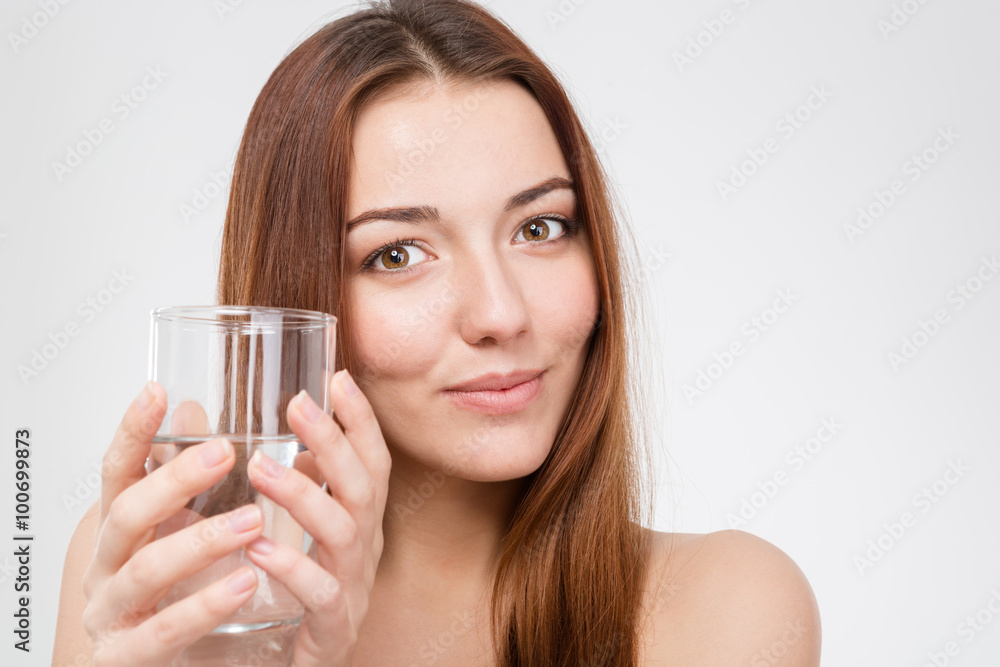 Pretty smiling young woman with glass of water Pretty smiling young woman with glass of water