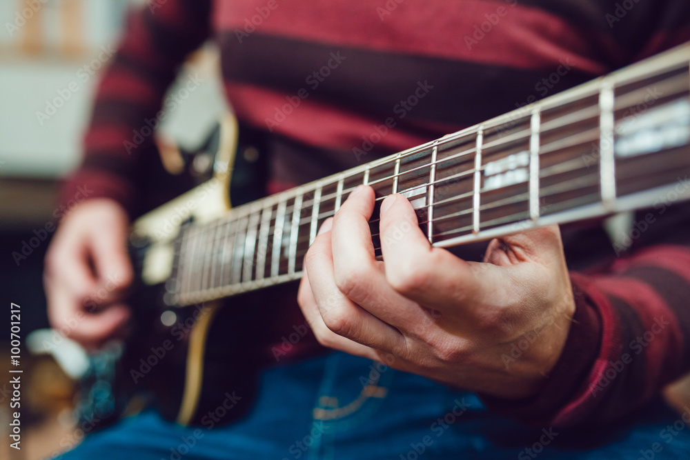 Fototapeta premium Man playing guitar