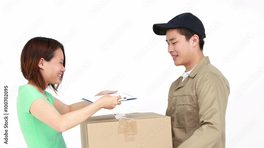 Happy delivery man delivering cardboard box Happy delivery man delivering cardboard box