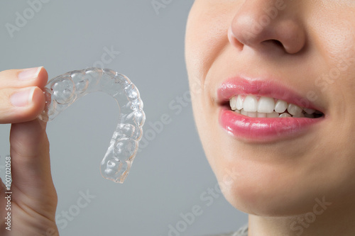 Smiling Woman with silicone trainer
