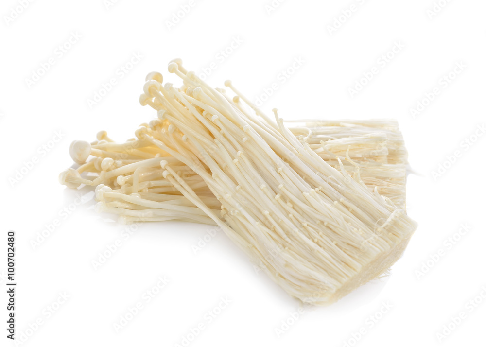 Fresh Enoki mushrooms on white background