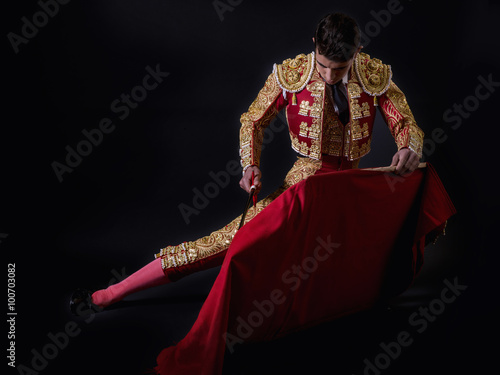 Slika na platnu Young bullfighter, dressed in traditional costume to fight
