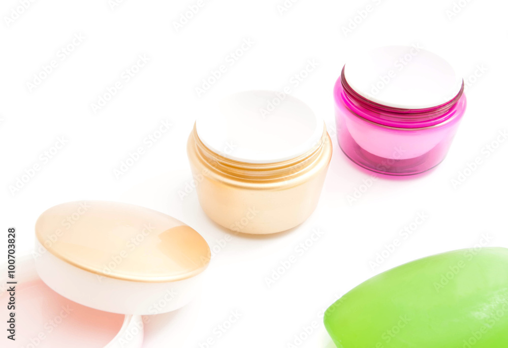 jars of cream and green soap jars of cream and green soap