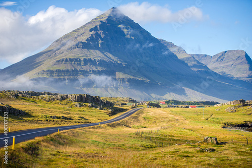 The Ring Road in Iceland. Route 1 or the Ring Road is a national road in Iceland that runs around the island and connects most of the inhabited parts of the country. The length of the road is 1332 km.