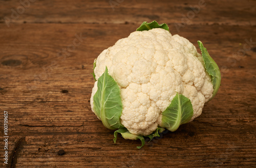 Fresh raw cauliflower on a kitchen bench.