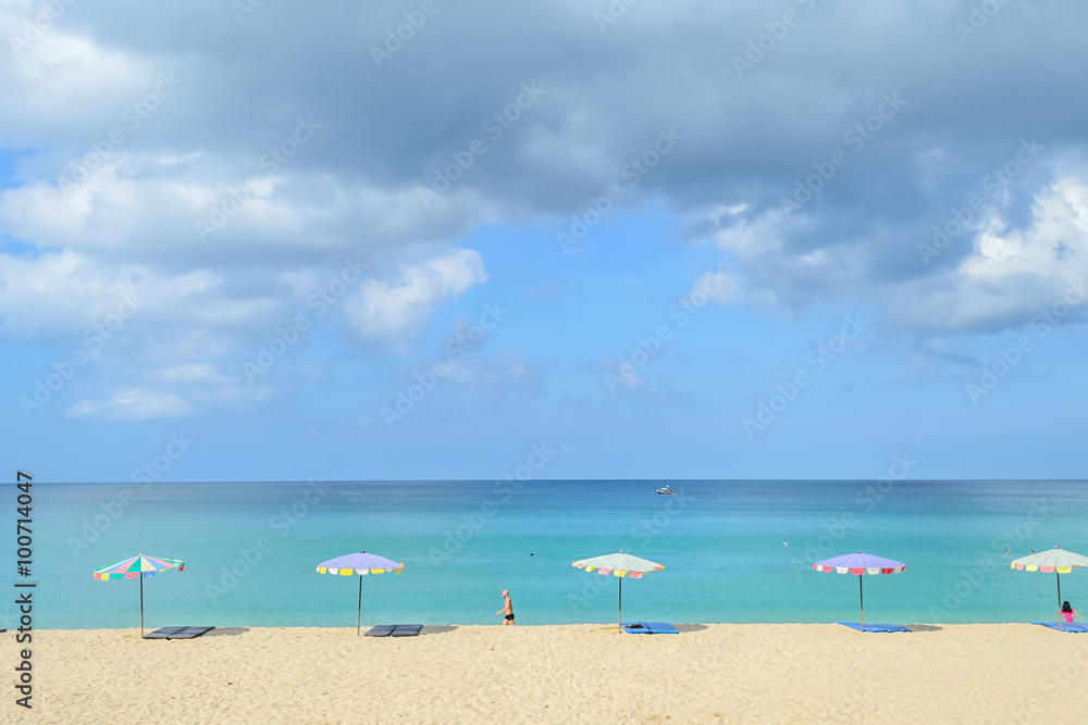 umbrella against the bright sky at Surin Beach in Phuket ,Thailand