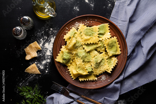 ravioli with spinach and ricotta cheese. Parmesan. in a plate photo