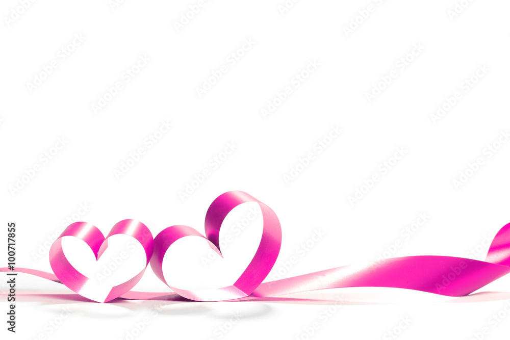 Ribbons shaped as hearts on white