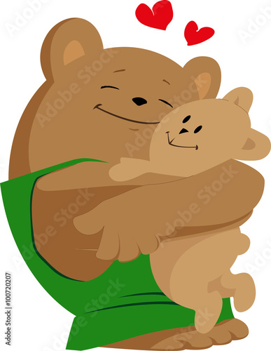 Bear hugging his teddy bear