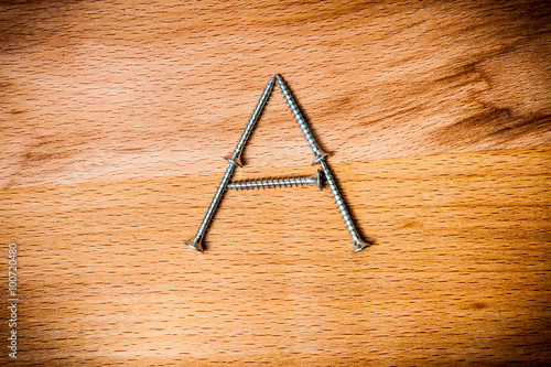 Letter A consist of screws.