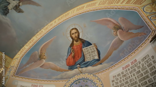 interior of the Russian Orthodox Church.image of Jesus Christ on the ceiling in the Christian Church photo