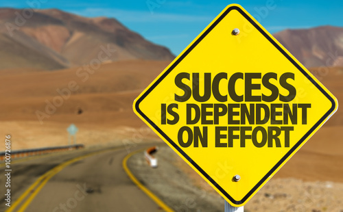 Success Is Dependent on Effort sign on desert road