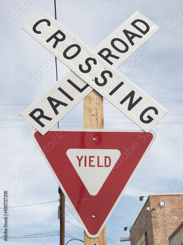 Crossing railroad street sign
