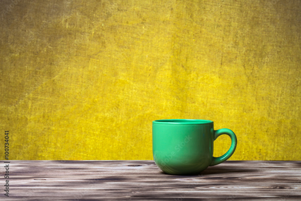 Cup of tea on new wooden board and burlap background Cup of tea on new wooden board and burlap background