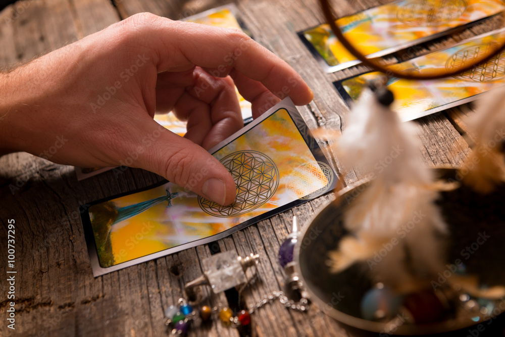 Hand with tarot cards