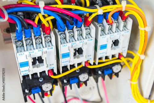 Close up circuit breakers and wire in control panel