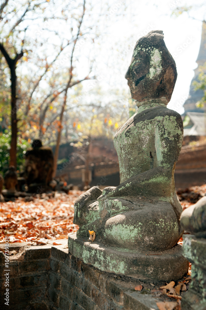 Ancient outdoor broken Buddhas in Wat Umong Suan Puthatham,Chieng Mai Province,Thailand.