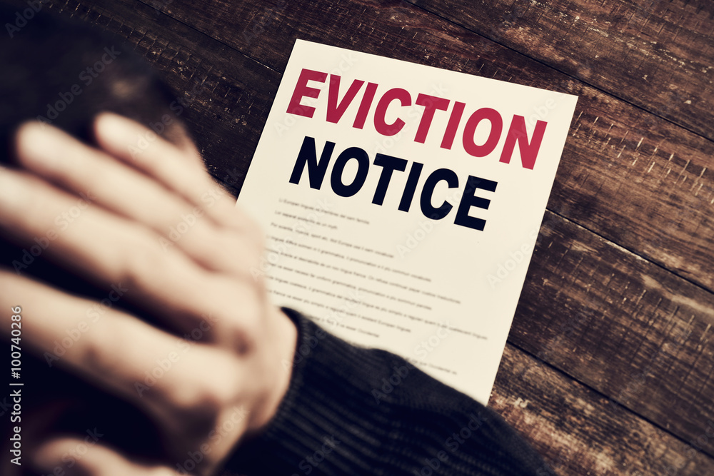 young man who has received an eviction notice - obrazy, fototapety, plakaty 