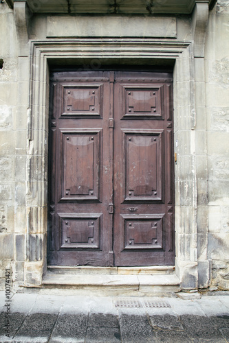 Old door in a street © aglphotography