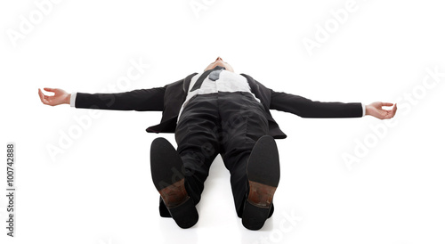 Canvas Print businessman lying on ground