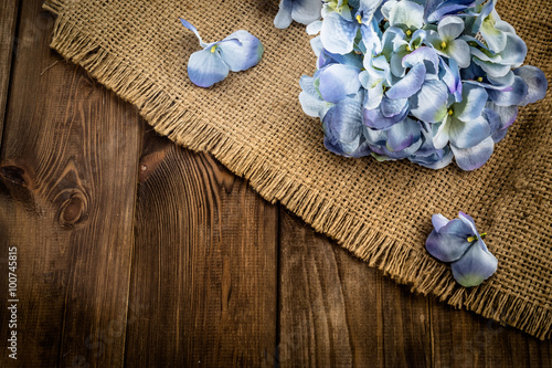 Vintage background with beautiful hydrangea on wooden