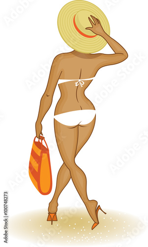 Voluptuous bathing beauty strolls along beach