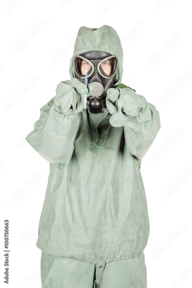 Man with protective mask and protective clothes holding a syring Man with protective mask and protective clothes holding a syring
