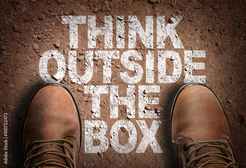 Top View of Boot on the trail with the text: Think Outside The Box photo