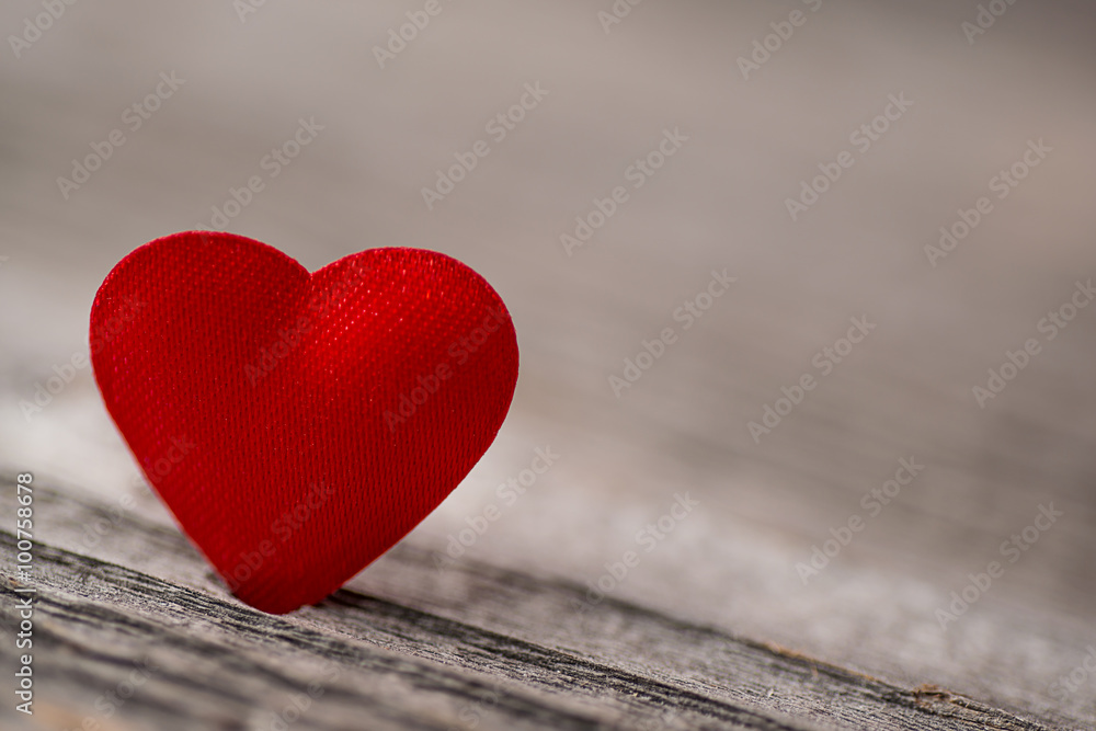 Red satin heart on wooden background, valentines or mothers day background, love celebrating Red satin heart on wooden background, valentines or mothers day background, love celebrating