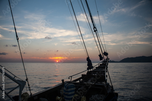 Bow of Ship and Sunset in Tropical Pacific