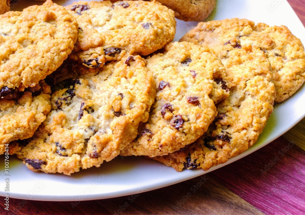 Oatmeal Raisin Cookies. Fresh plate of warm oatmeal raisin cookies. Oatmeal Raisin Cookies. Fresh plate of warm oatmeal raisin cookies.