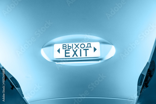 Exit sign  in passenger airplane