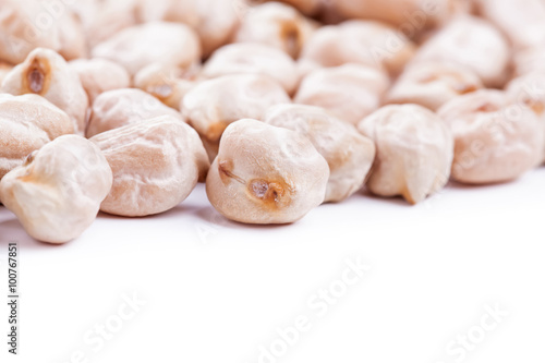 Raw dry chickpeas on white background