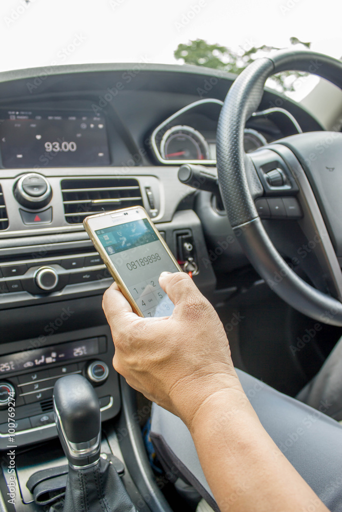 man use telephone while driving car man use telephone while driving car
