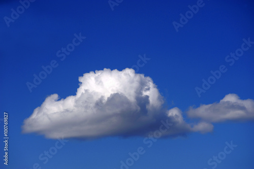 single white cloud on blue sky