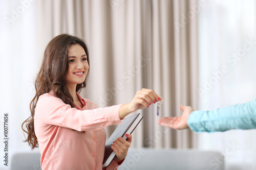 Friendly female estate-agen...