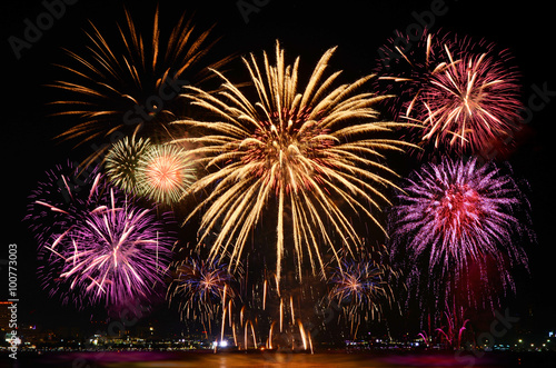 Firework celebration from the sea shore.