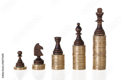 Chess Pieces On Stacked coins