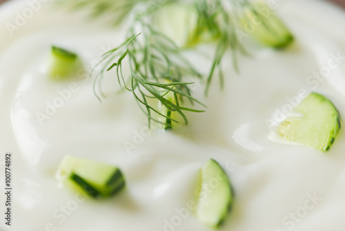 Cucumber yogurt in glass bowl