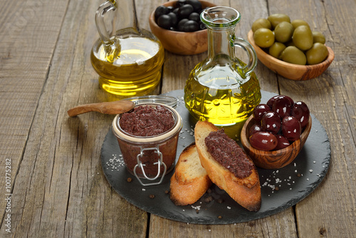 Tapenade, olives and olive oil photo