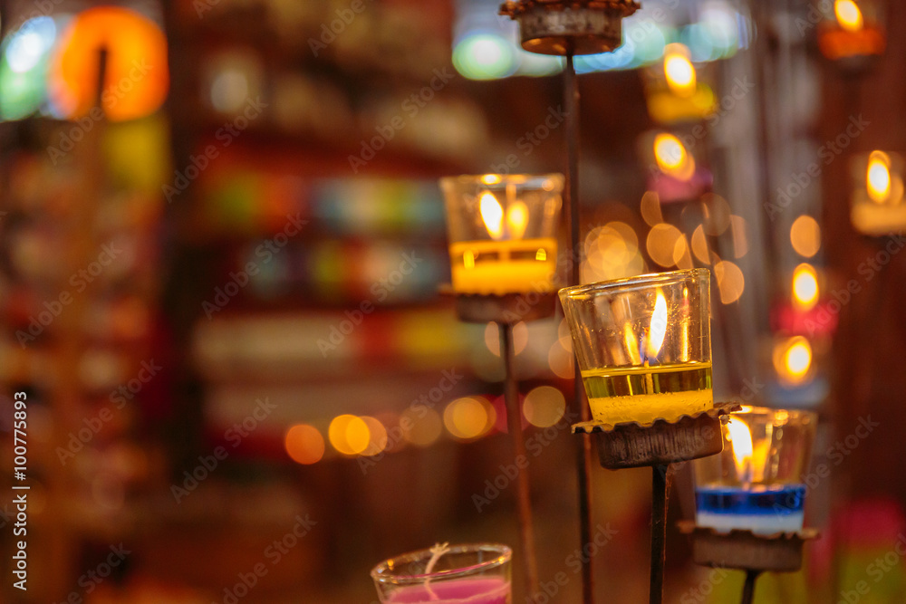 Colorful scented candles with beautiful lighting and bokeh.