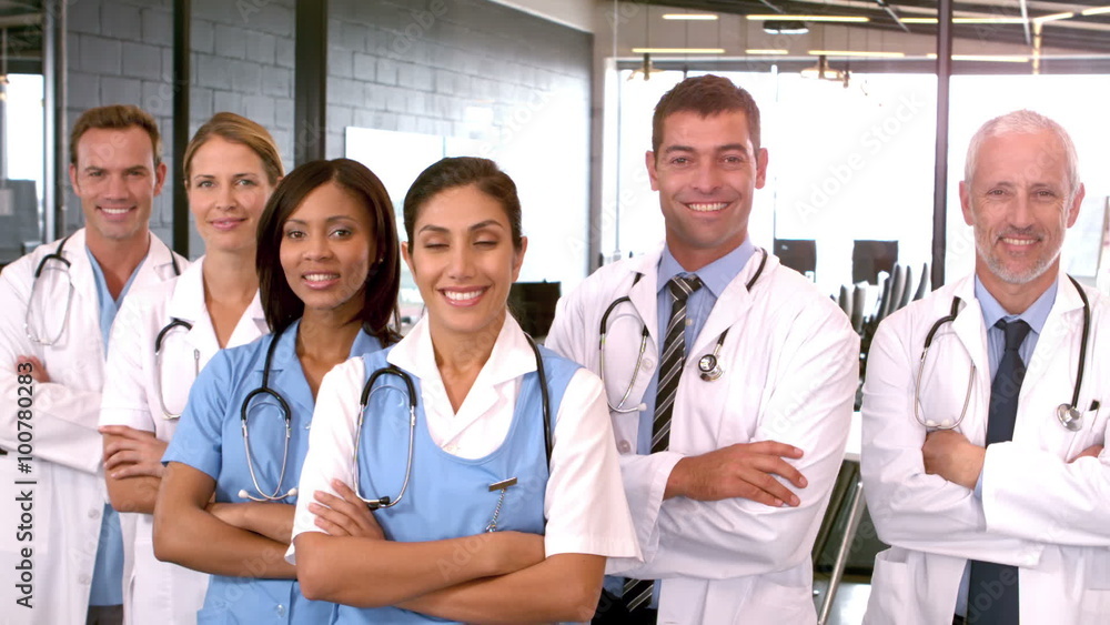 Smiling medical team with arms crossed Smiling medical team with arms crossed