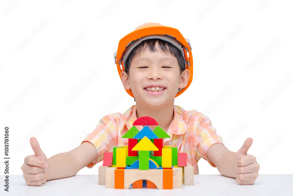 Young Asian boy playing construction blocks Young Asian boy playing construction blocks
